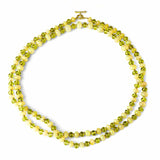 Simple but elegant Ethiopian Opal and Peridot stones, 36 inches in length necklace, threaded on silk with toggle clasp.