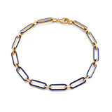 Discerning 18-karat yellow gold bracelet detailed with lapis blue enamel and an adjustable lobster lock.