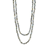 An exquisite Labradorite &amp; Pyrite Mogul bead necklace with a small toggle clasp strung on silk with 18 karats yellow gold.
